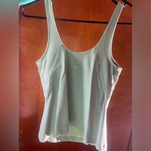 Lulu built in bra tank size 4 new condition worn once. Pastel green/mint color